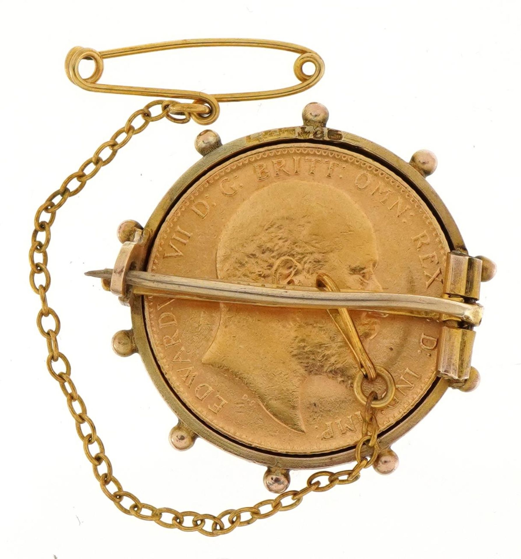 Edward VII 1910 gold sovereign housed in a 9ct gold brooch mount with safety chain, 2.7cm in - Image 2 of 3