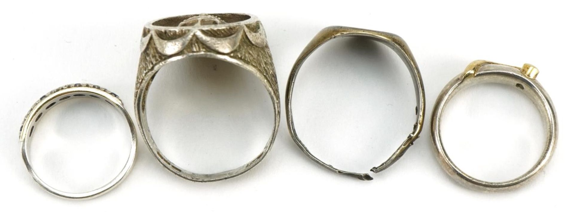 Four antique and later silver rings including a blue and clear stone half eternity, various sizes, - Image 3 of 4