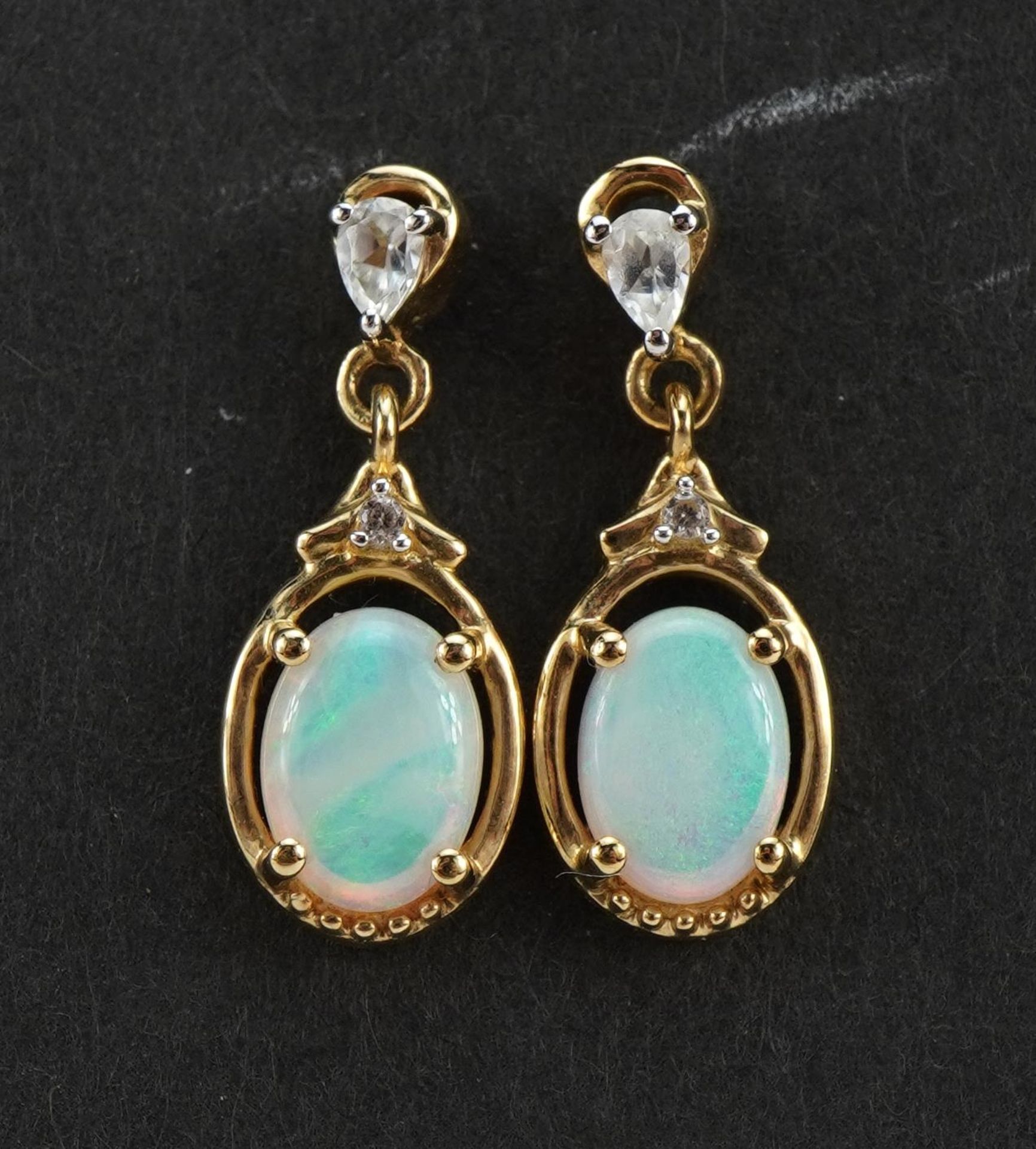Pair of 9ct gold opal and clear stone drop earrings, the clear stones test as sapphire, 1.8cm