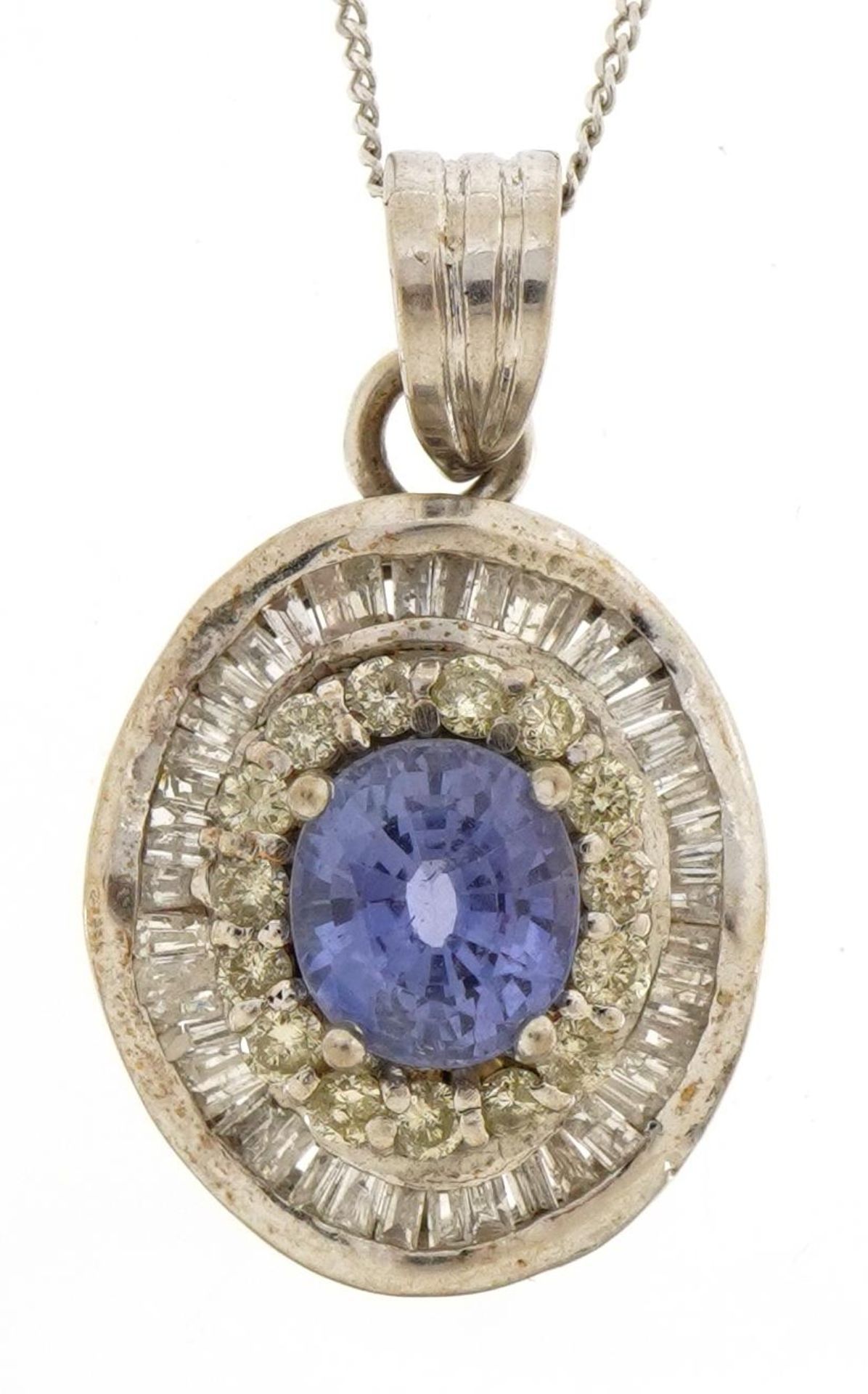 Unmarked white gold sapphire and diamond halo pendant with baguette cut diamonds on a 9ct white gold