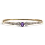 9ct gold diamond and amethyst hinged bangle, the bracelet stamped 0.10 carat, 6.3cm wide, 7.4g : For