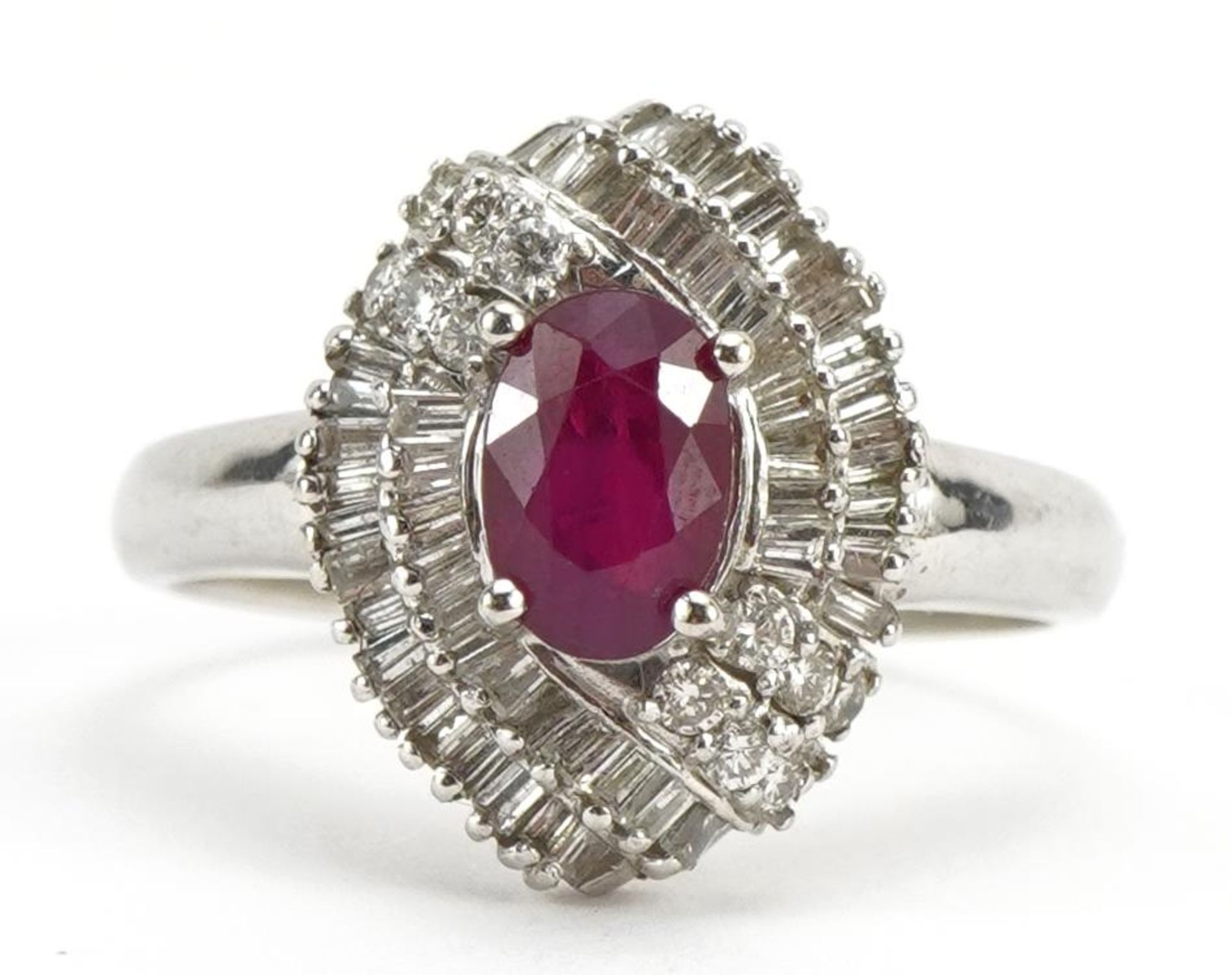 14k white gold ruby and diamond cluster ring, the ruby approximately 6.8mm x 4.7mm, size N, 3.8g :