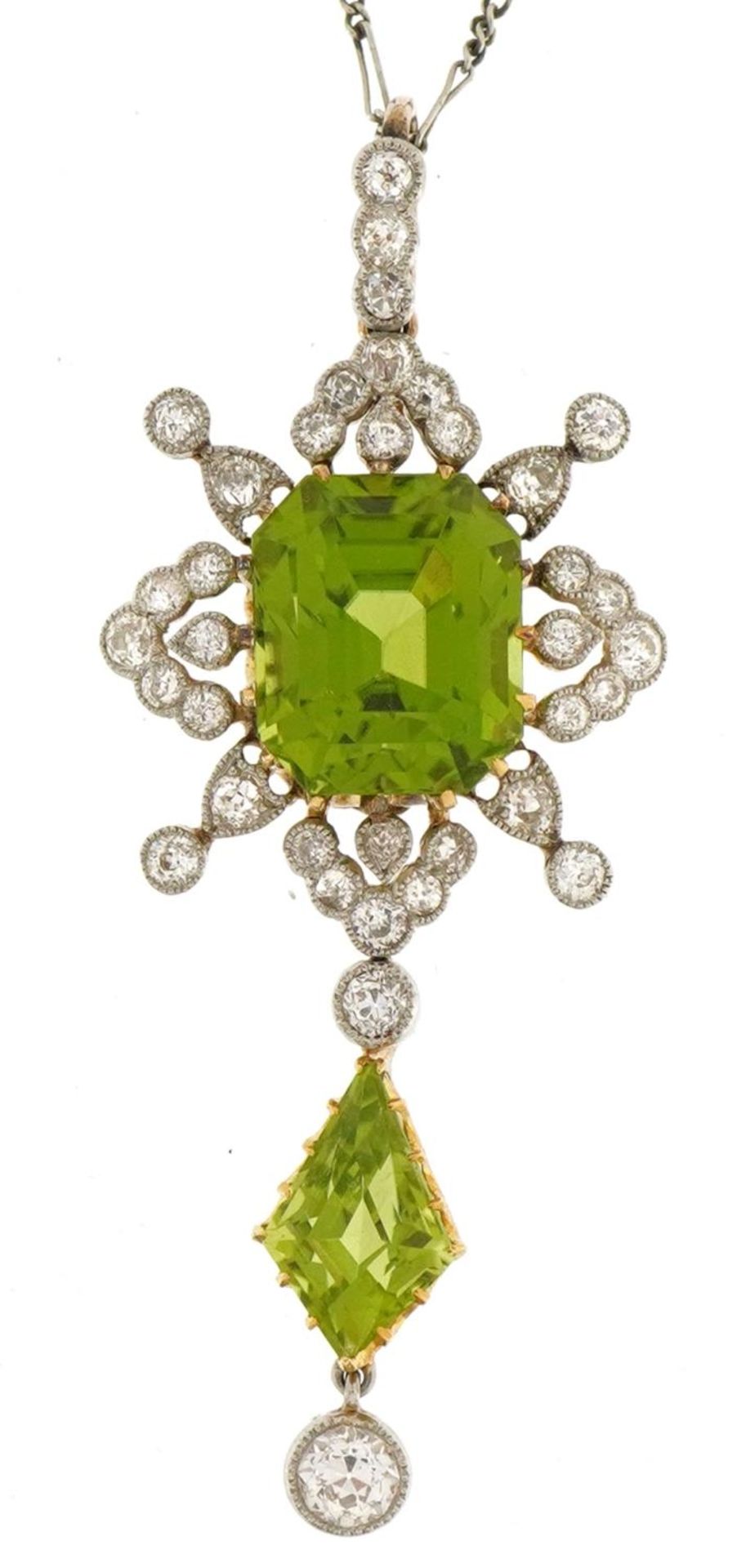 Antique unmarked gold green stone and diamond cluster drop pendant on white metal Figaro link