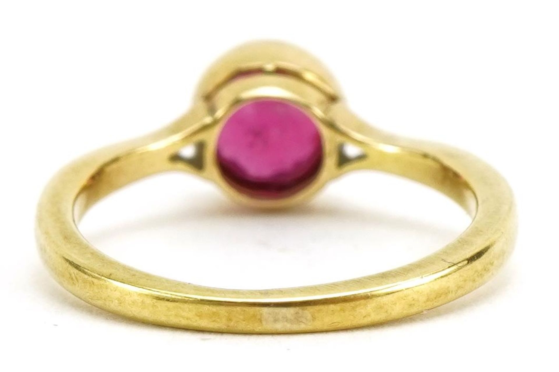 18ct gold ruby solitaire ring, the ruby approximately 5.6mm in diameter, indistinct hallmarks, - Bild 2 aus 4