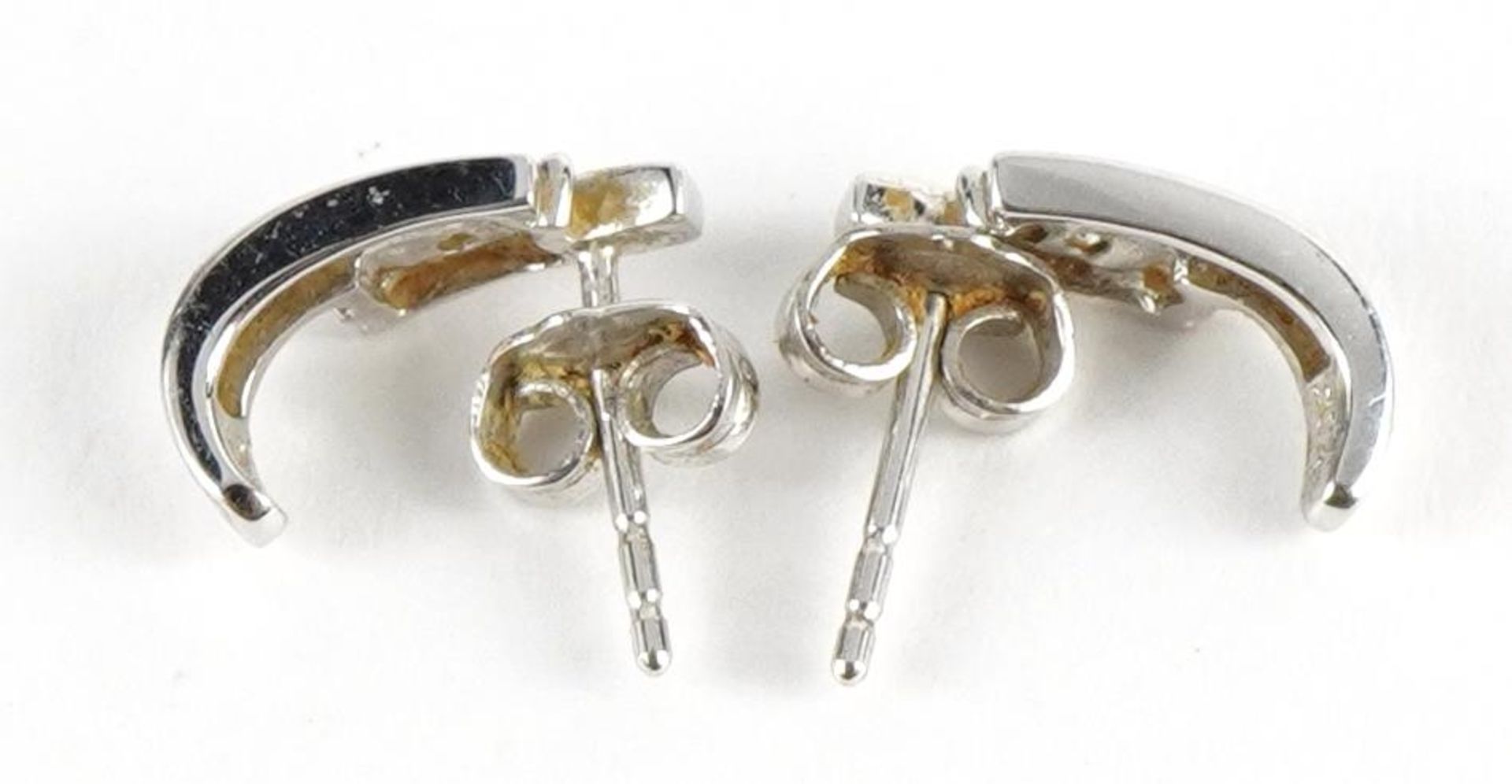 Pair of 9ct white gold diamond stud earrings, 1.1cm high, 1.2g : For further information on this lot - Image 3 of 3