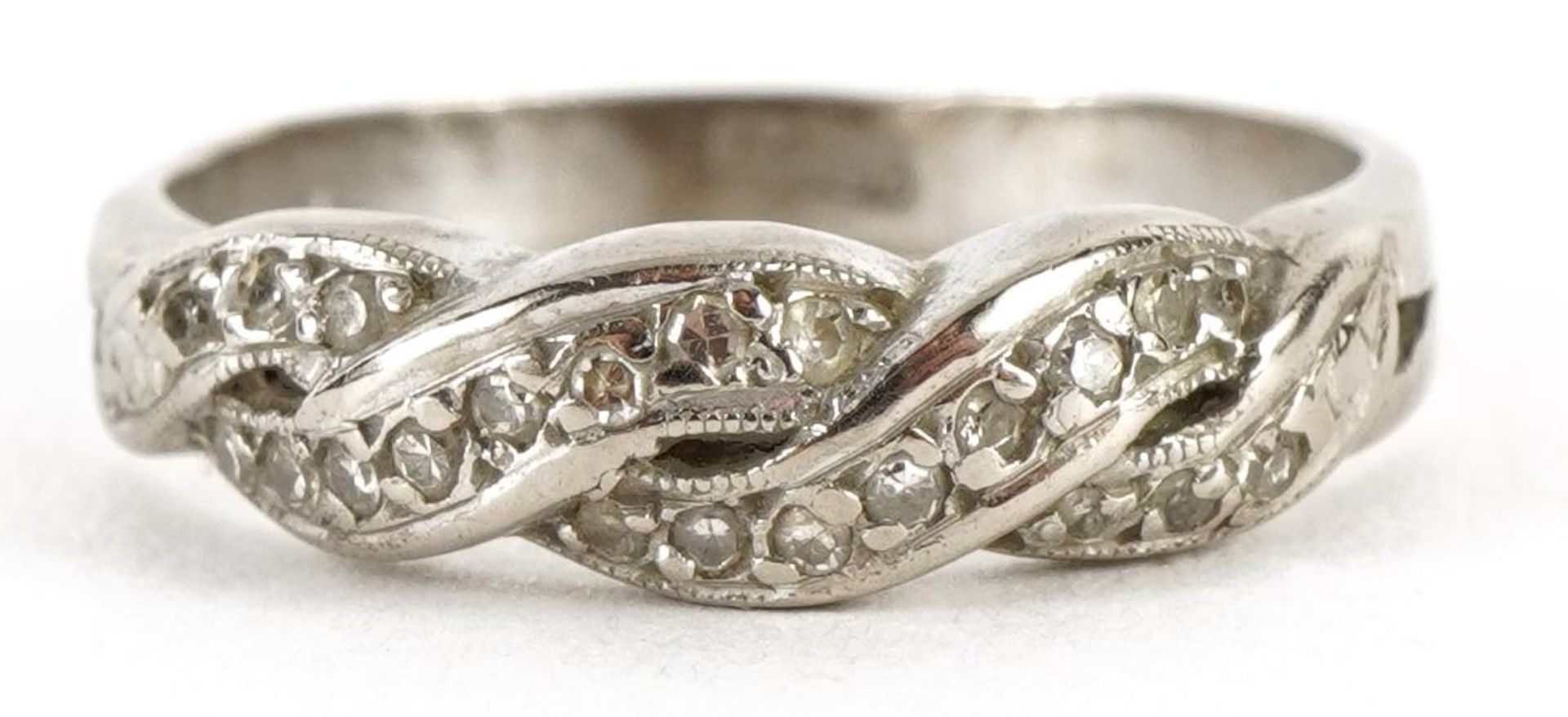 18ct white gold diamond crossover ring, size O, 4.1g : For further information on this lot please