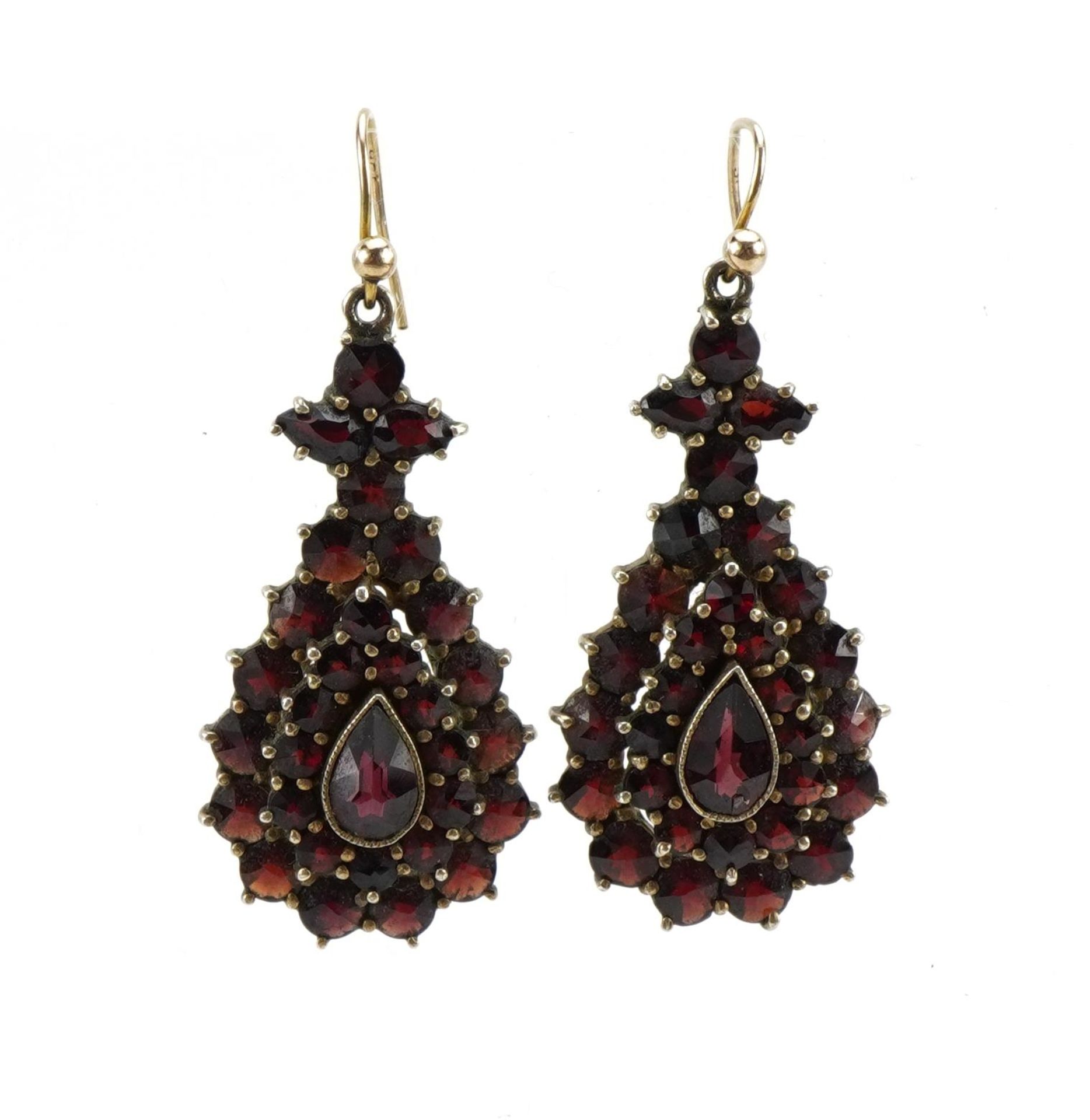 Pair of 9ct gold and silver gilt Bohemian garnet tear drop cluster drop earrings, 4.1cm high, 7.6g :