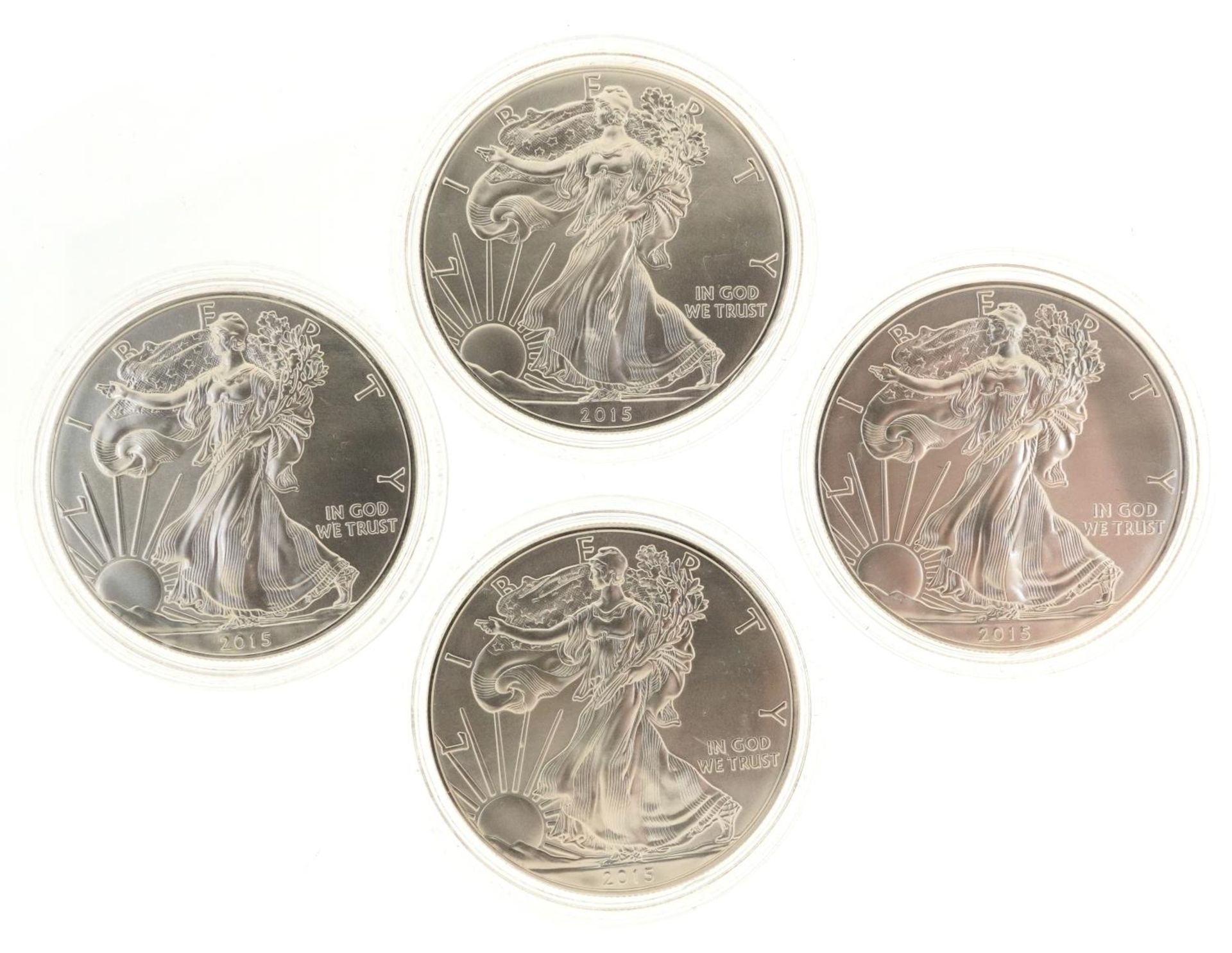 Four 2015 United States of America one ounce fine silver Liberty dollars : For further information