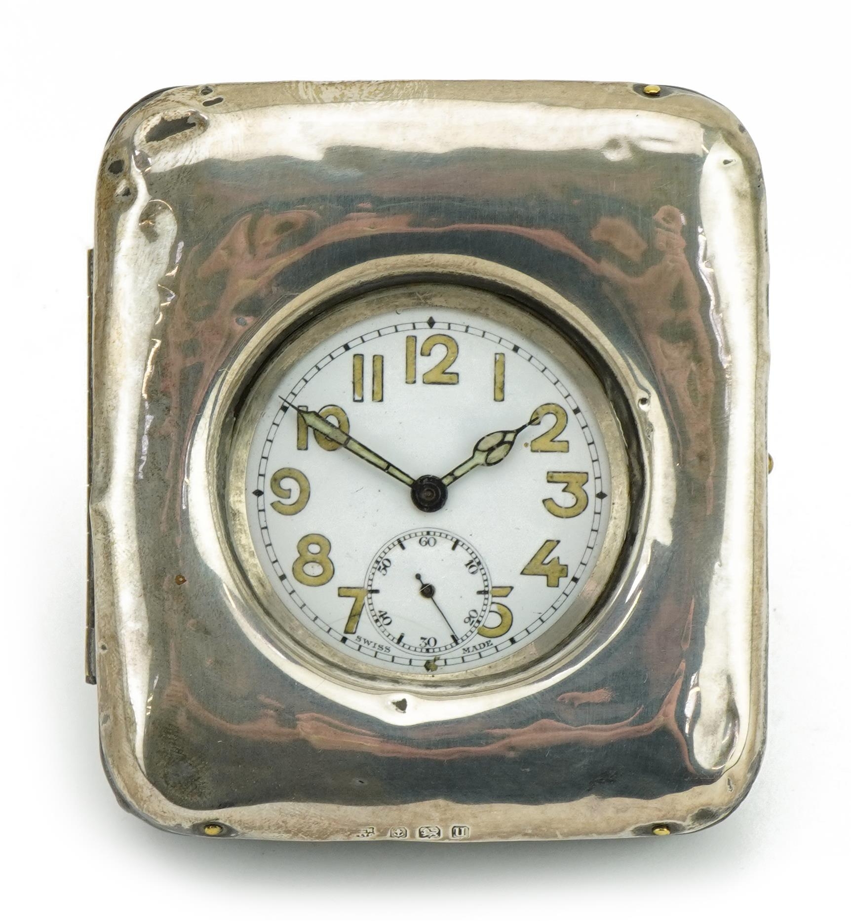 Gentleman's open face pocket watch with military type dial housed in a silver mounted strut pocket