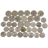Collection of George V pre 1947 British florins and shillings, 269.0g : For further information on
