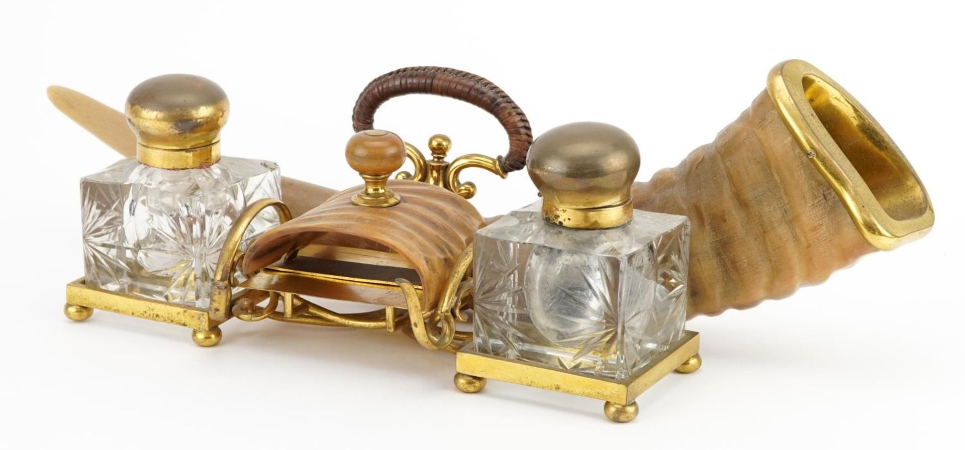 Edwardian gilt brass and horn desk stand with two glass inkwells engraved To the indefatigable and