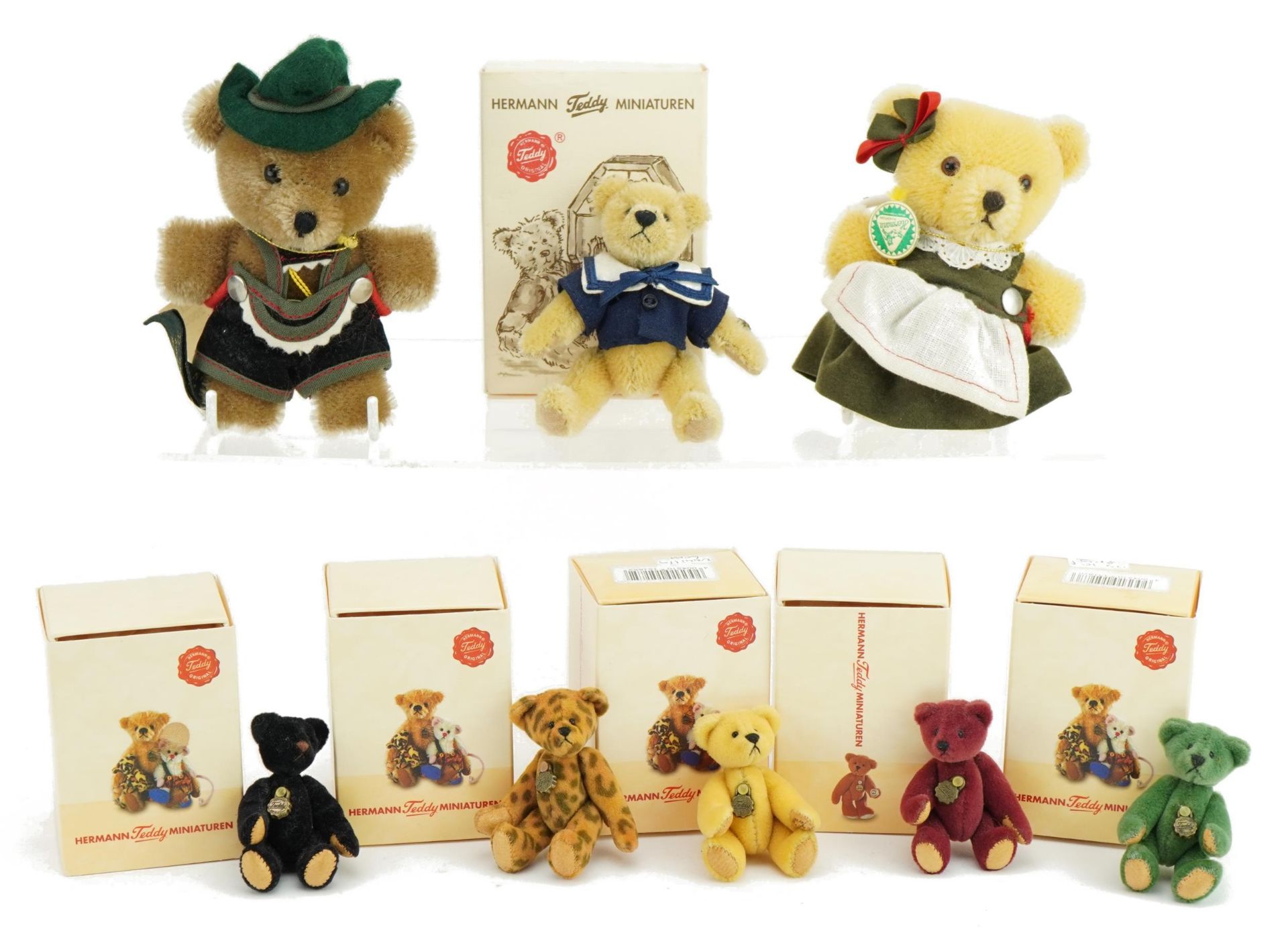 Eight Hermann miniature teddy bears, six with boxes, the largest 13cm high : For further information