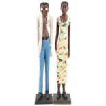 Pair of floor standing hand painted carved wood figures, each 87cm high : For further information on