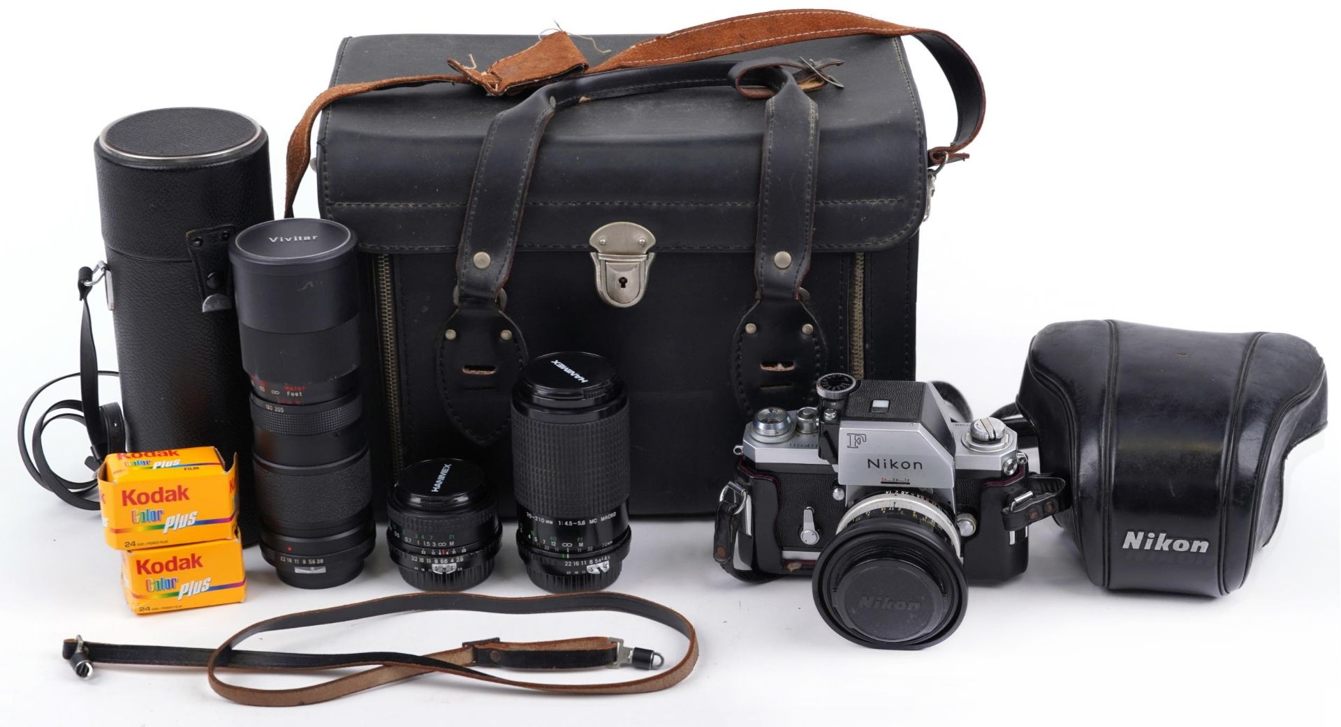 Nikon F SLR camera with lenses and carry bag comprising Nikon 50mm lens, Vivitar 85mm-205mm lens,