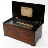 19th century French inlaid rosewood music box with nine bells playing on a thirteen inch brass