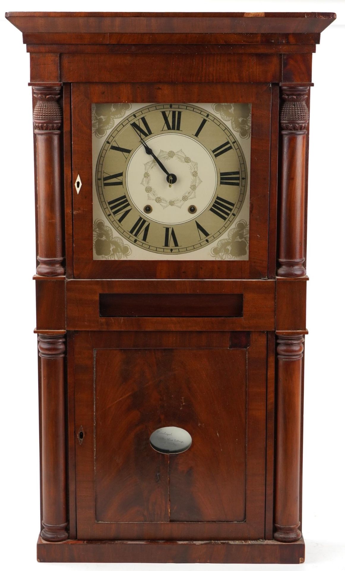 C Jerome & Co, American mahogany cased striking wall clock, the silvered dial with Roman numerals,