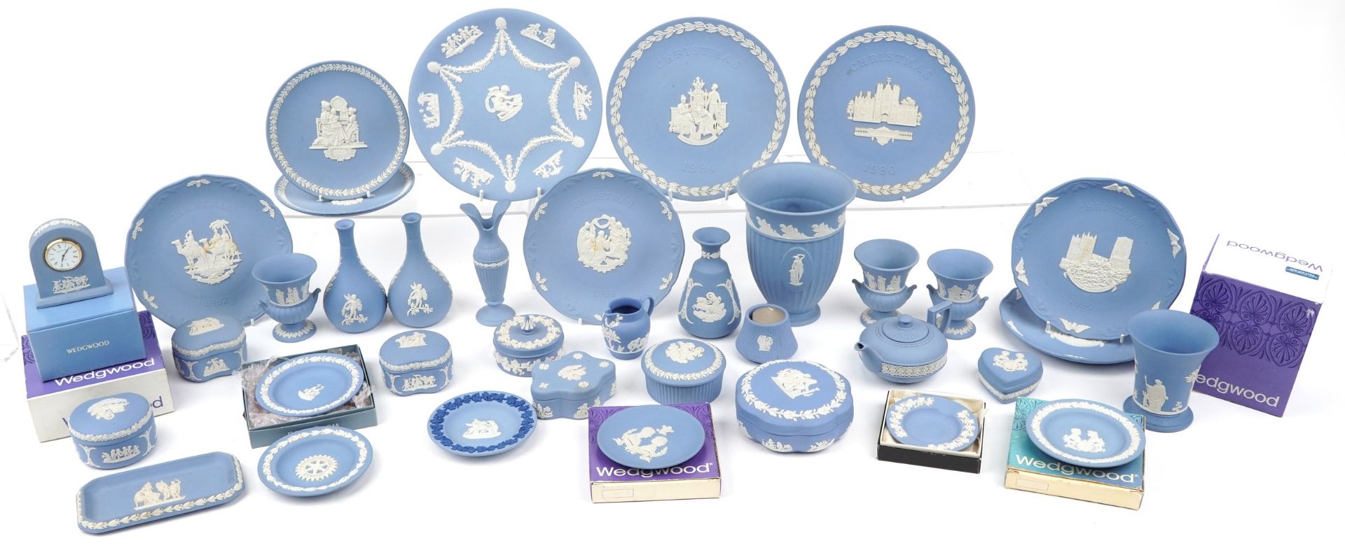 Collection of Wedgwood blue and white Jasperware, some with boxes, including vases, Christmas