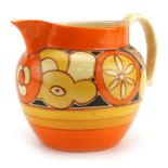 Clarice Cliff, Art Deco Bizarre jug hand painted in the sliced fruit pattern, 20cm in length : For