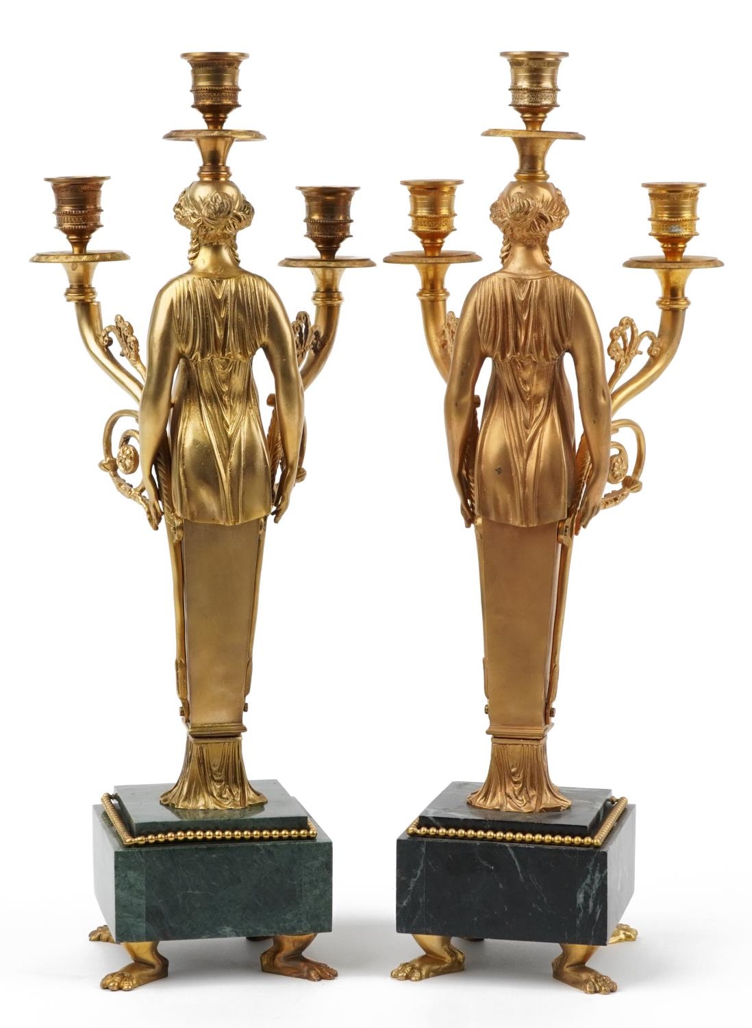 Pair of French Empire style ormolu three branch figural candelabras raised on square marbleised - Image 3 of 4