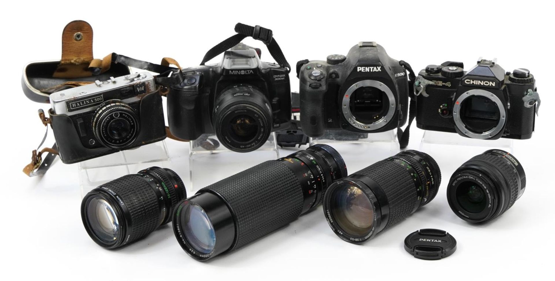 Group of vintage and later cameras and lenses including Minolta Dynax 300SI, Chinon CE-4 and