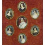 Framed display of seven oval portrait miniatures of Konig Ludwig I and six females housed in an