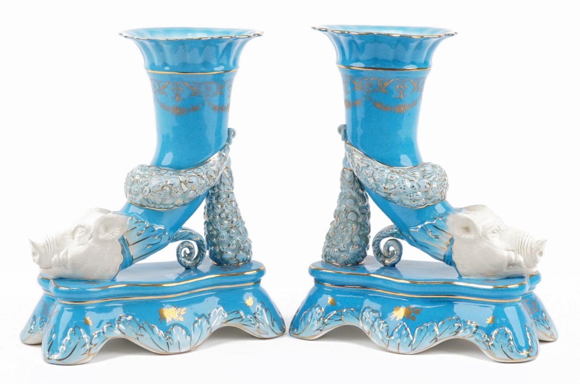 Manner of Sevres, pair of continental porcelain cornucopia vases in the form of wild boars, each