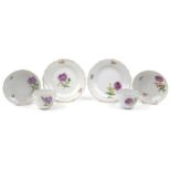 Meissen, German porcelain hand painted with flowers comprising two cups with saucers and two side