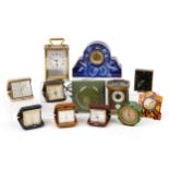 Twelve antique and later clocks including Swiza travel clocks, Art Deco faux tortoiseshell strut