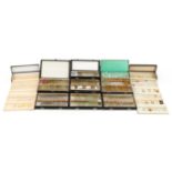 Collection of early 20th century and later glass microscope specimen slides arranged in three....