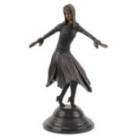 Large patinated bronze study of an Art Deco dancer raised on a circular marble base, 54cm high : For