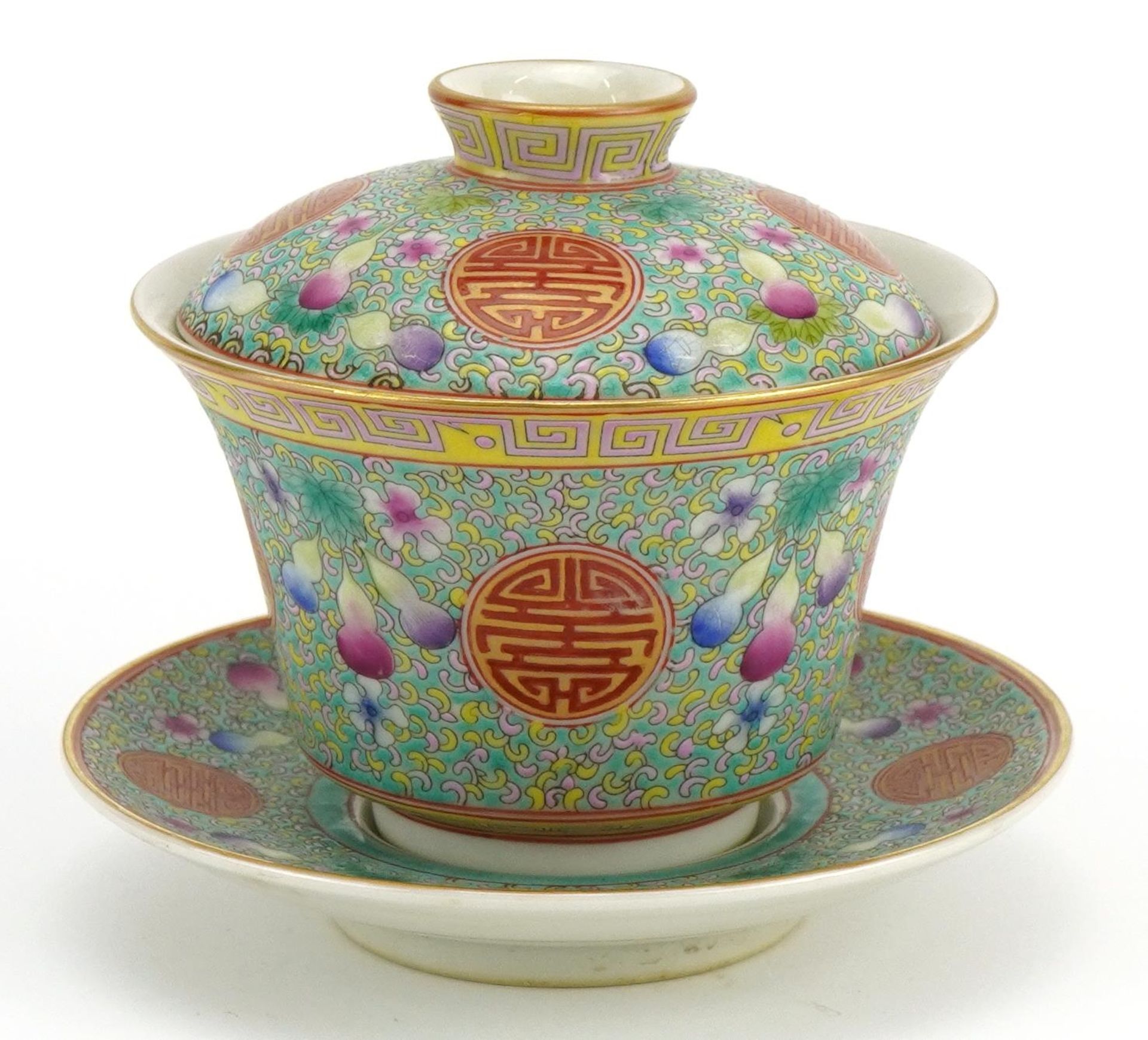 Chinese blue ground porcelain tea bowl and cover on stand hand painted in the famille rose palette - Image 2 of 4