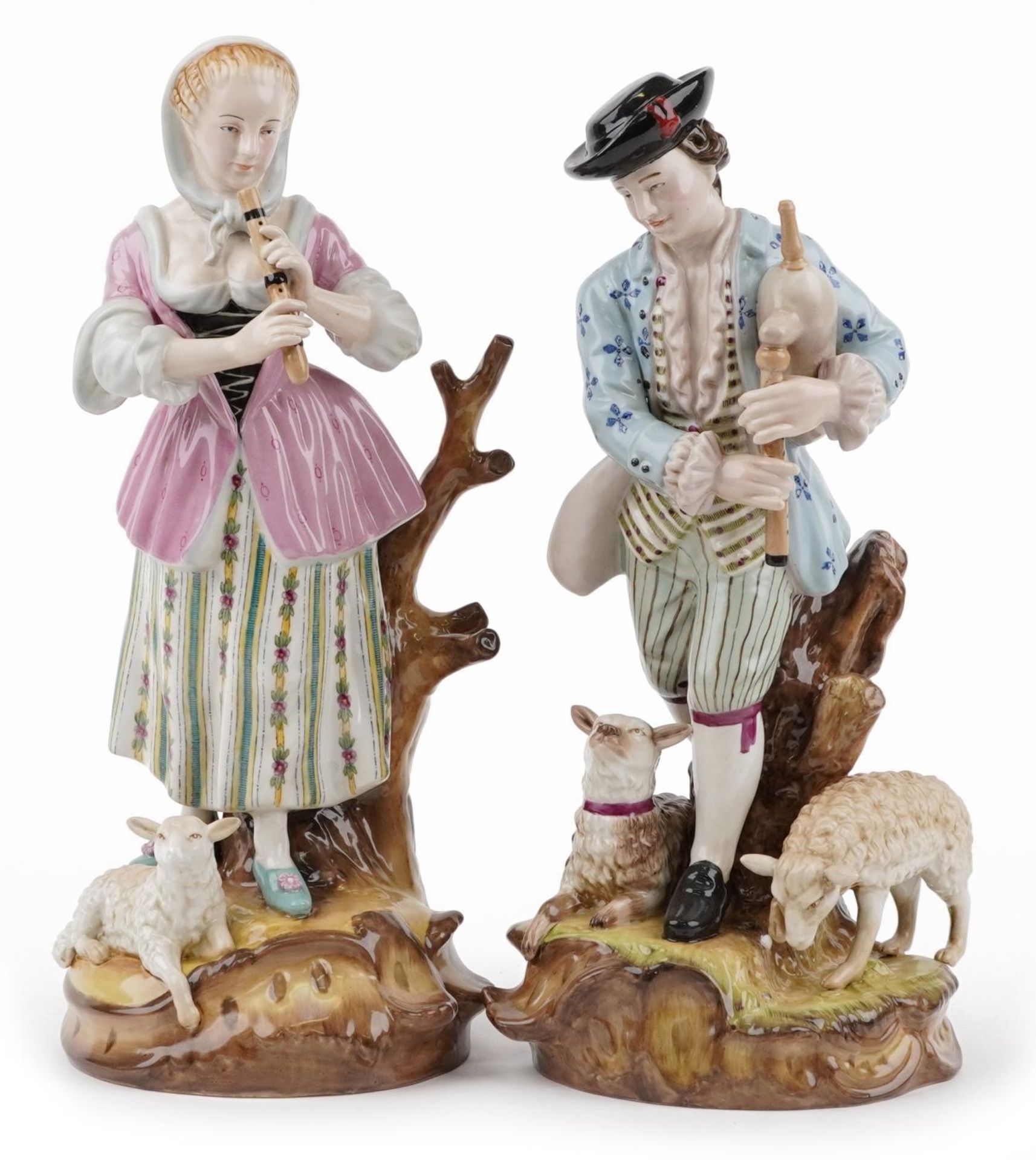 Manner of Sevres, pair of continental porcelain figures of a shepherd and shepherdess, the largest