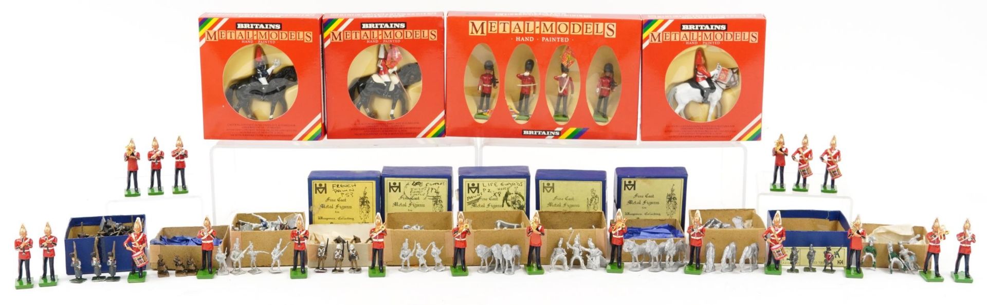 Collection of Britains hand painted metal figures with boxes and a large collection of miniature