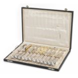 Set of twelve German 800 grade silver handled knives with velvet and silk lined fitted case, the