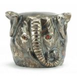 Cast silver gilt vodka cup in the form of an elephant with ruby eyes, impressed Russian marks, 7cm