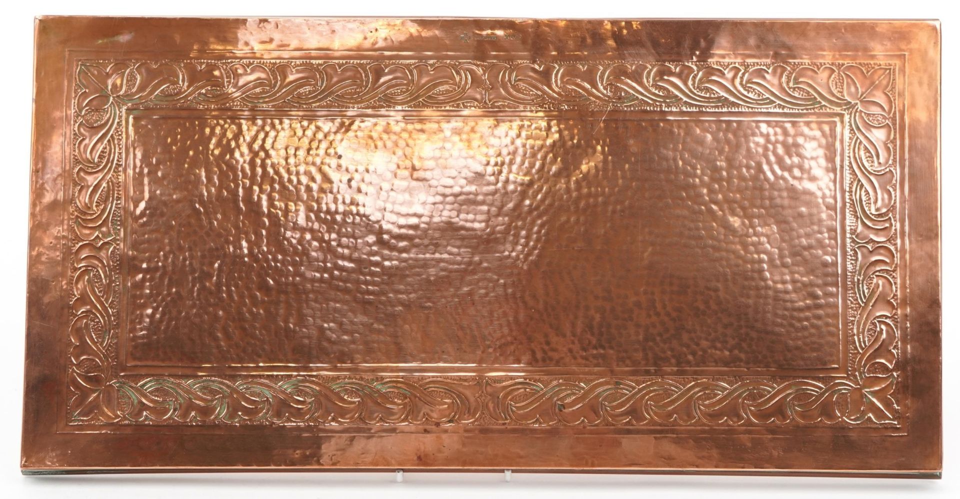 Keswick, Arts & Crafts beaten copper train engraved with stylised foliage, impressed marks to the - Image 2 of 3