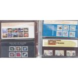Collection of Royal Mint presentation packs arranged in two albums, various genres and denominations