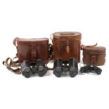 Three pairs of vintage binoculars with cases including two pairs by Trieder Binocle C P Goerz of