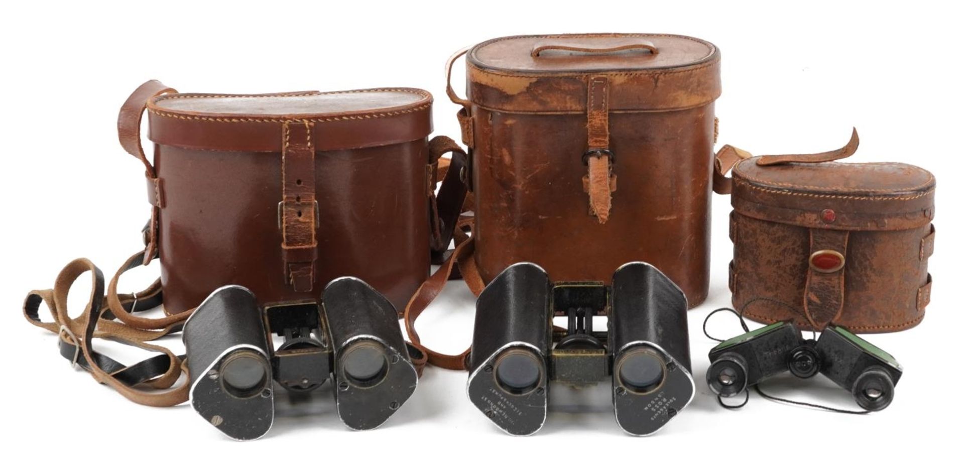 Three pairs of vintage binoculars with cases including two pairs by Trieder Binocle C P Goerz of