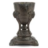Classical patinated metal centrepiece with rams heads, 23.5cm high : For further information on this