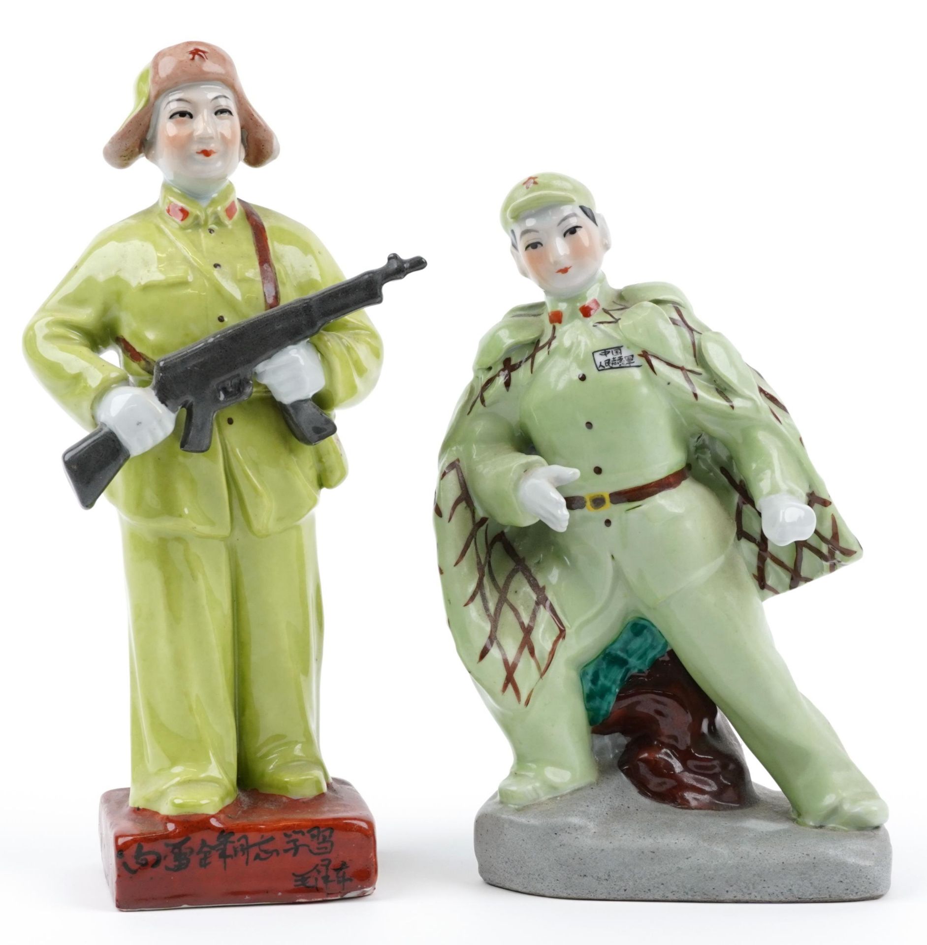 Two Chinese porcelain Cultural Revolution propaganda figures including one of a soldier holding guns