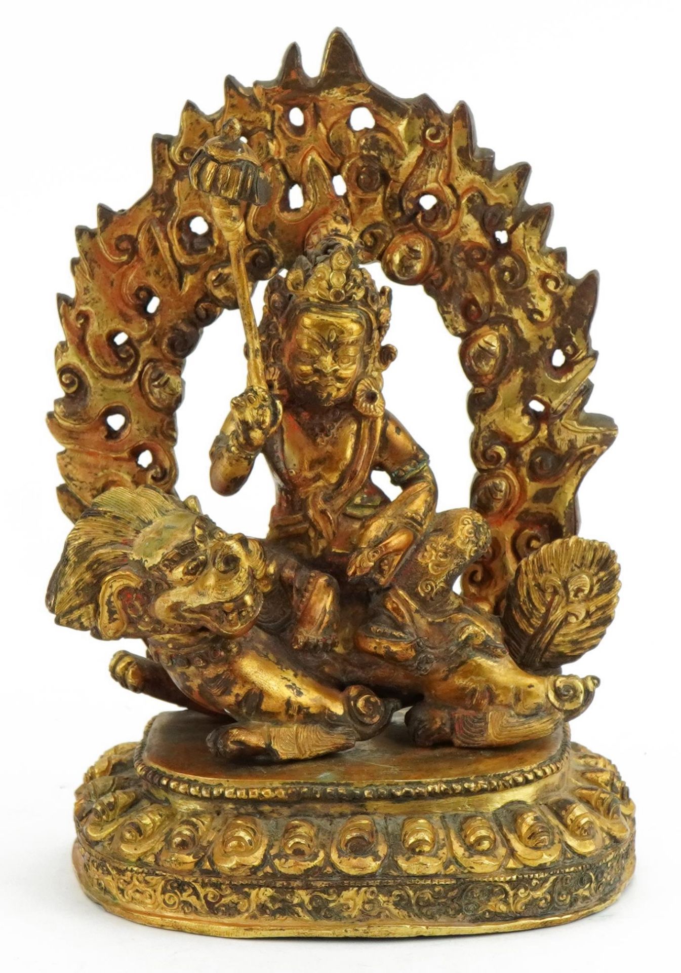 Chino Tibetan gilt bronze deity on mythical animal, 17cm high : For further information on this