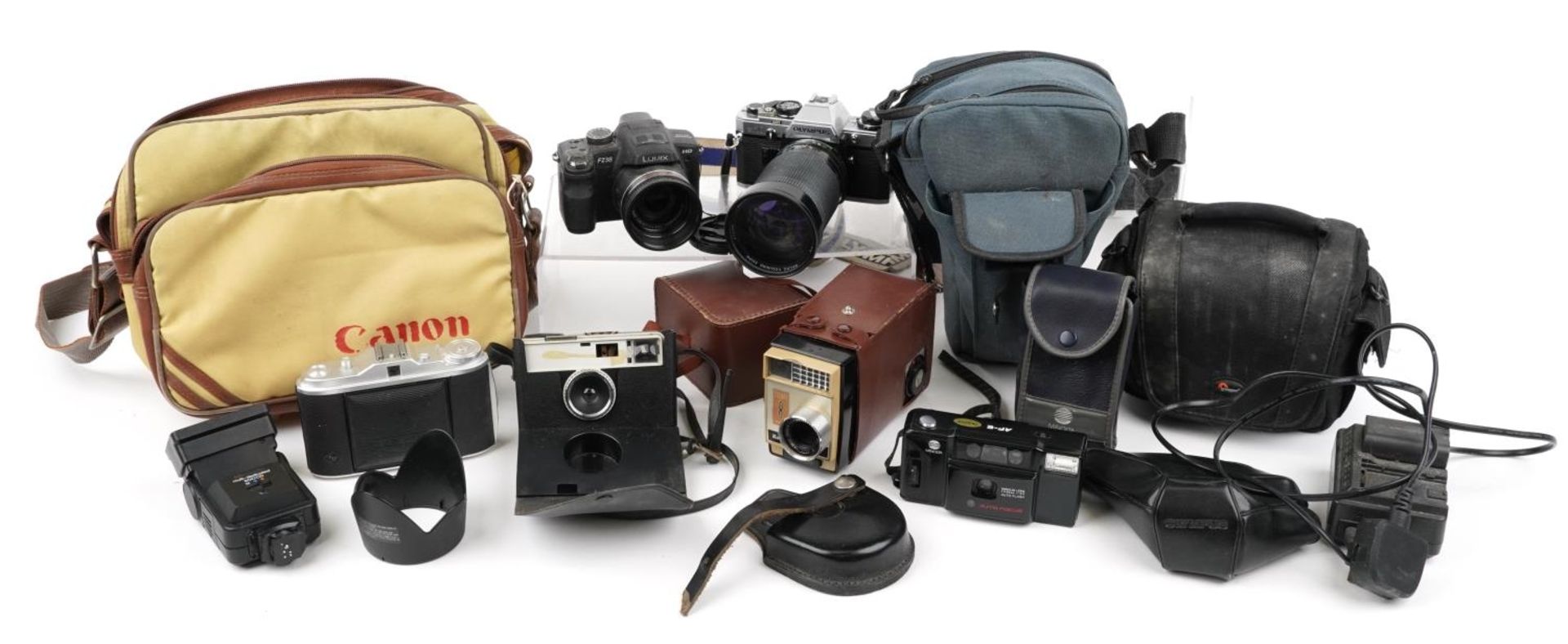 Vintage and later cameras, lenses and accessories including Olympus OM10 with Vivitar 28-210mm lens,