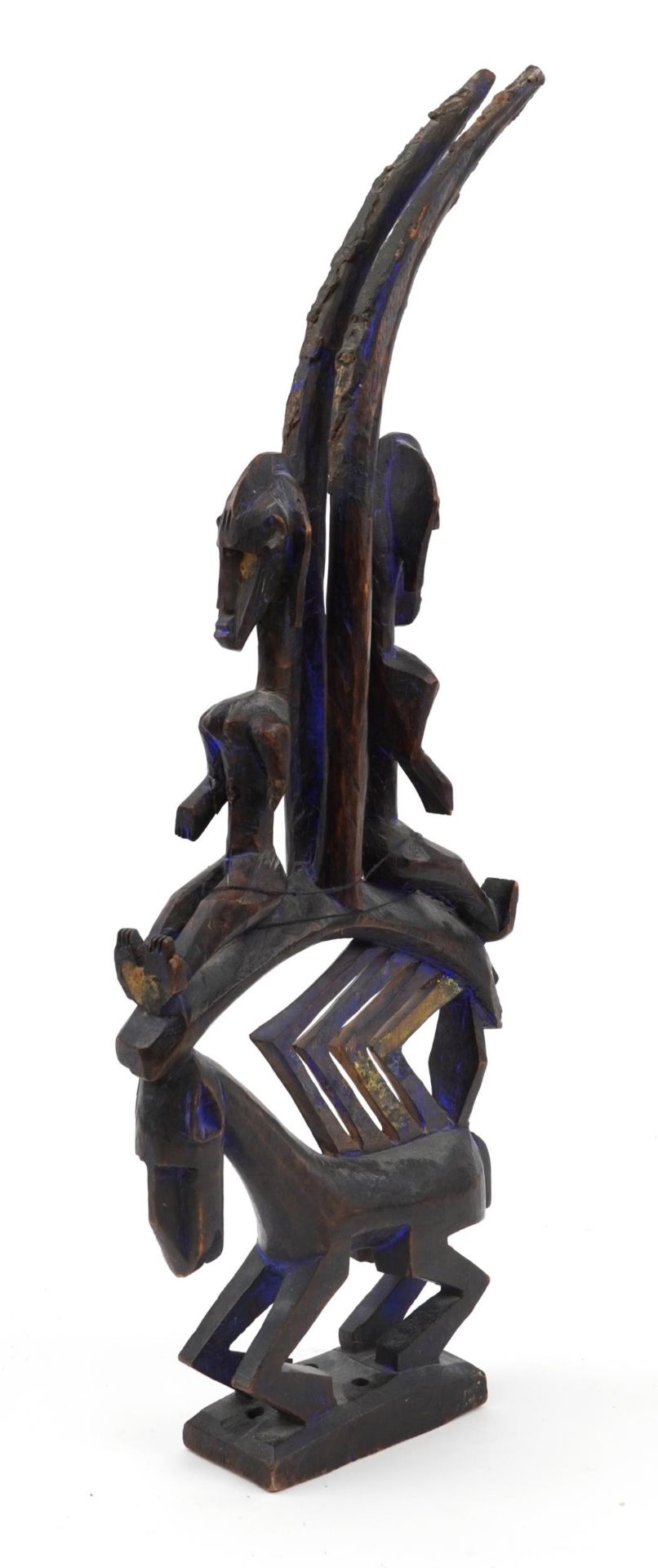 African tribal interest Dogon tribe carving of two figures on an animal back, 65cm high : For