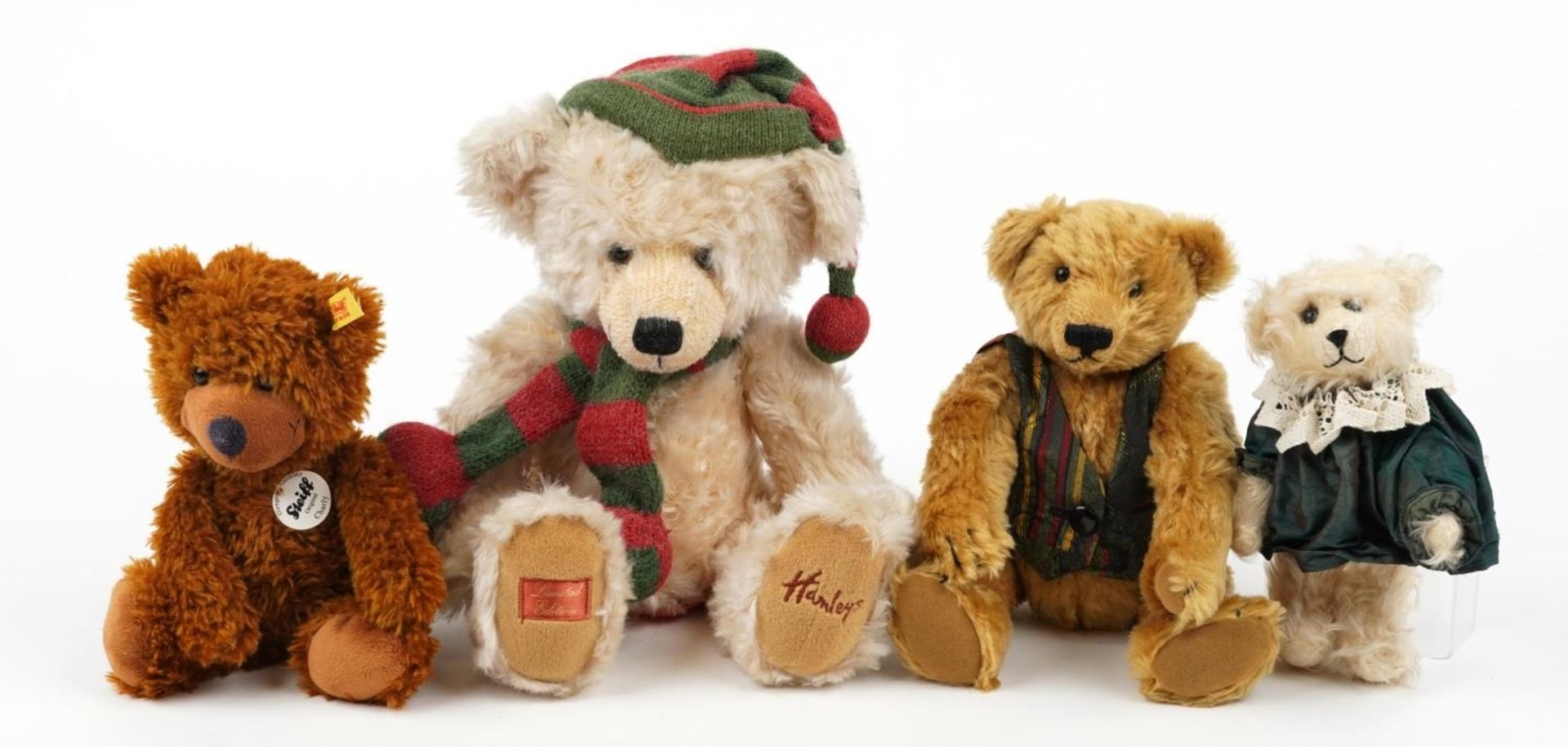 Four teddy bears including Steiff Charly and Hambey's limited edition bear, the largest 32cm