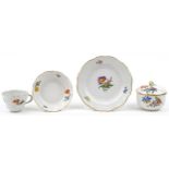 Meissen, German porcelain hand painted with flowers comprising a trio and pot with cover having a