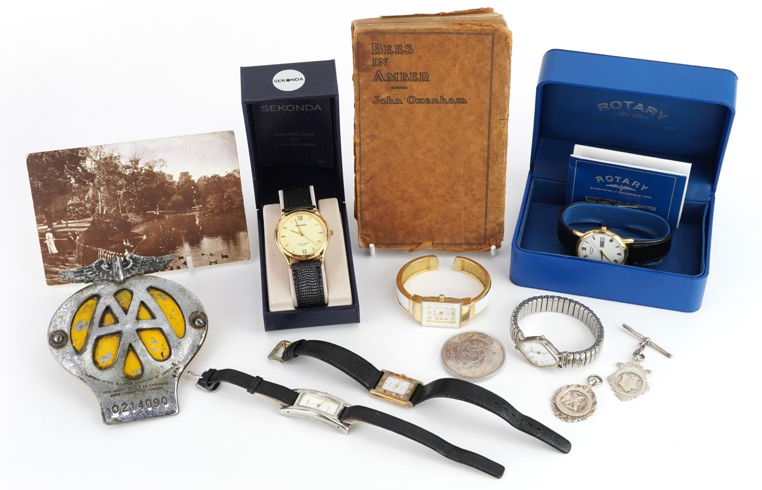 Sundry items including wristwatches, two silver fobs and an AA car badge : For further information