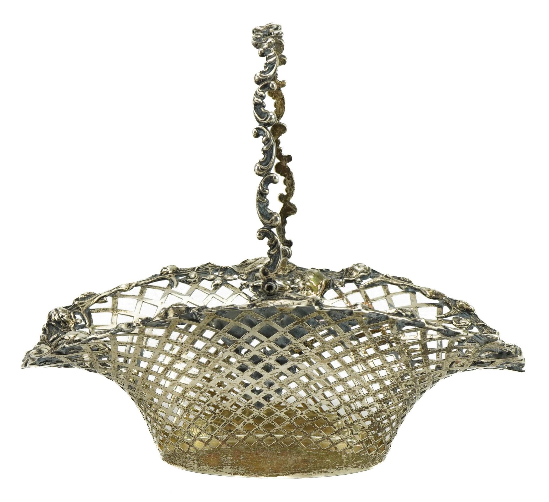 The Metcalfe Company, sterling silver gilt pierced basket with swing handle embossed with flowers