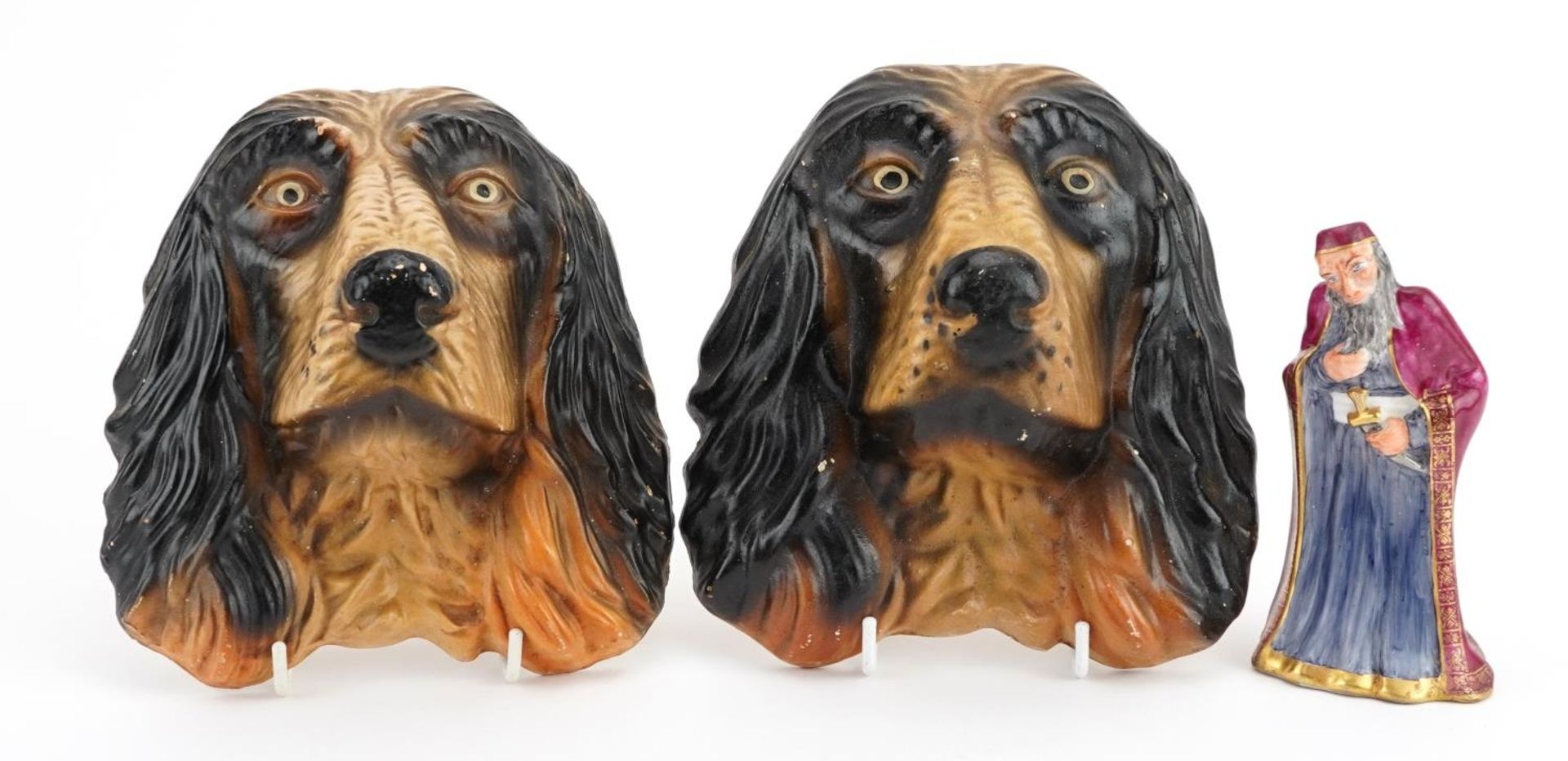 Pair of Spaniel design pottery wall plaques and a Crown Staffordshire figure, the largest each