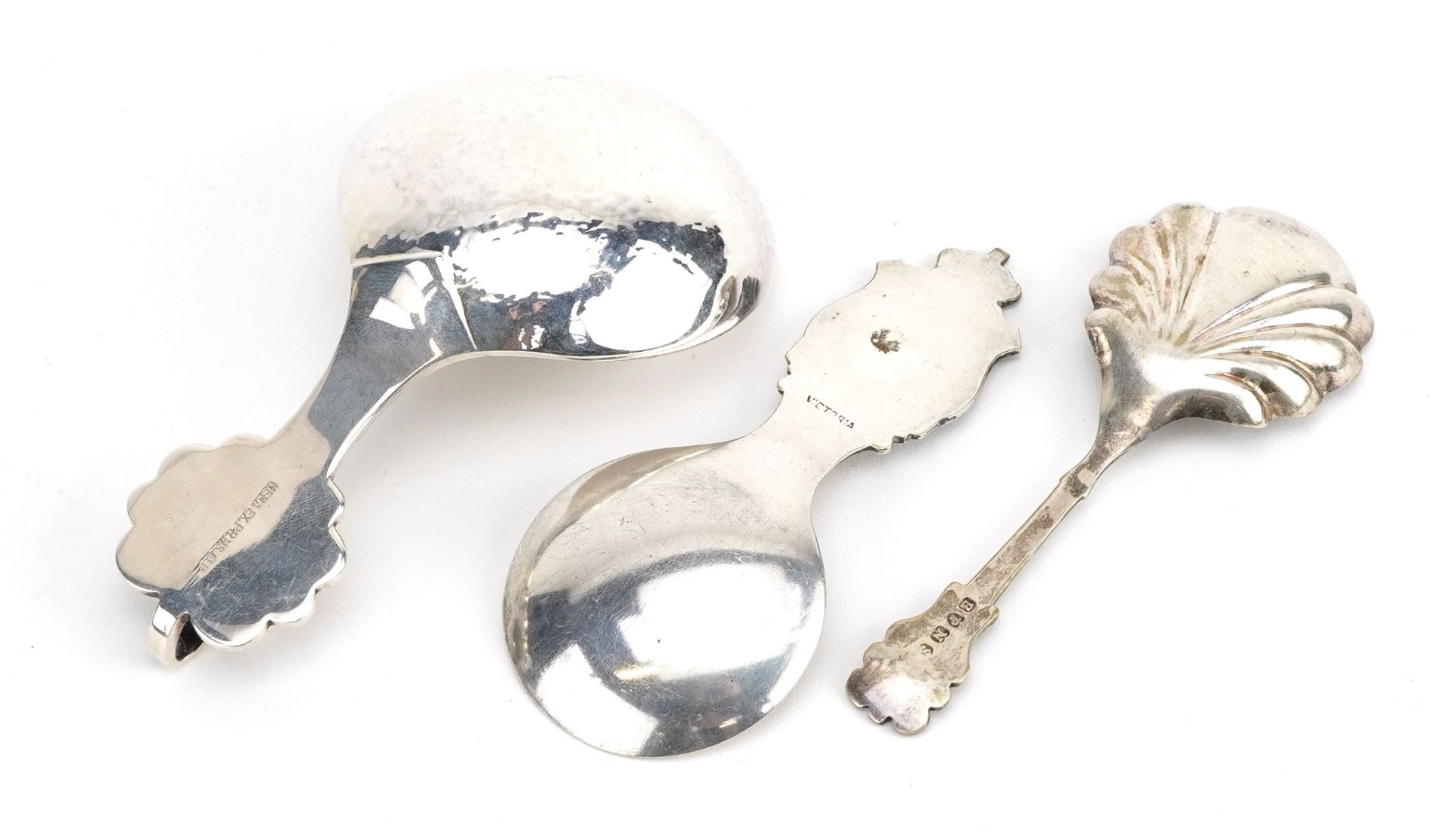 Three decorative arts caddy spoons including one with planished bowl in the style of Georg Jensen, - Image 2 of 3